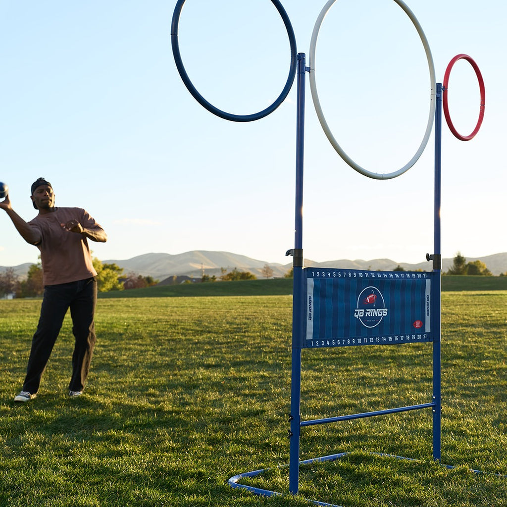 Player lining up a throw at the QB Rings game in a park