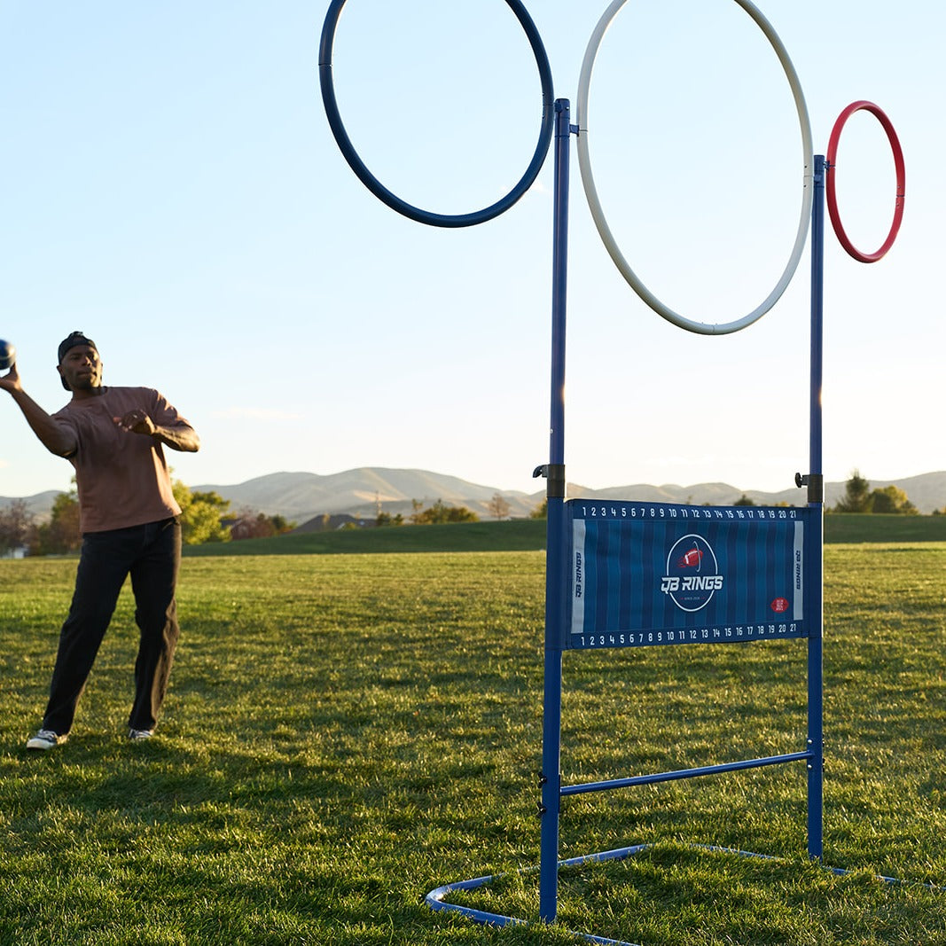 Player lining up a throw at the QB Rings game in a park