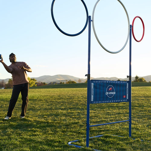 Player lining up a throw at the QB Rings game in a park